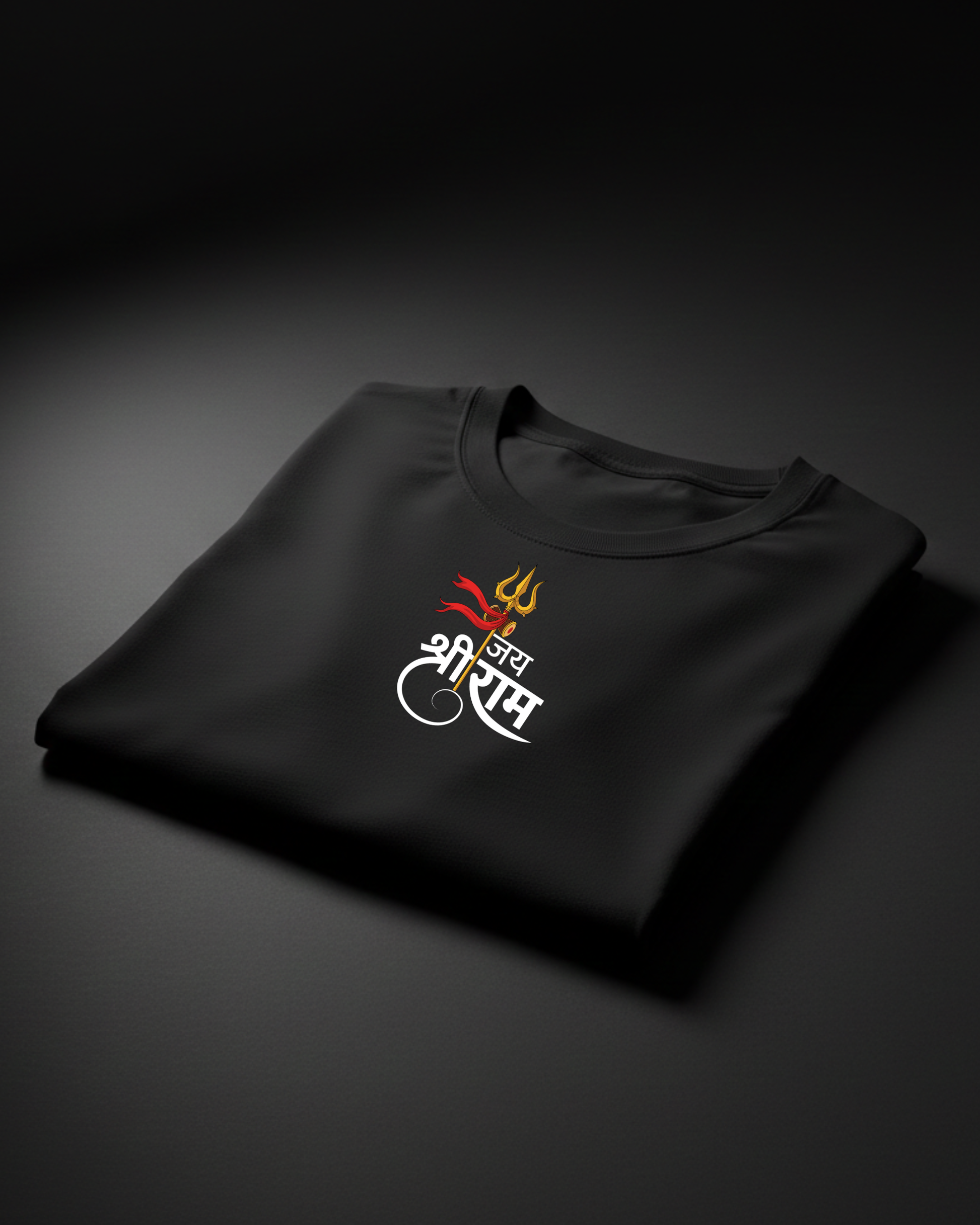 Folded black t-shirt with a logo on a dark background